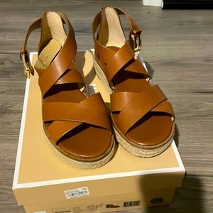 NWT Michael Kors Darby sandal in luggage is: 7.5